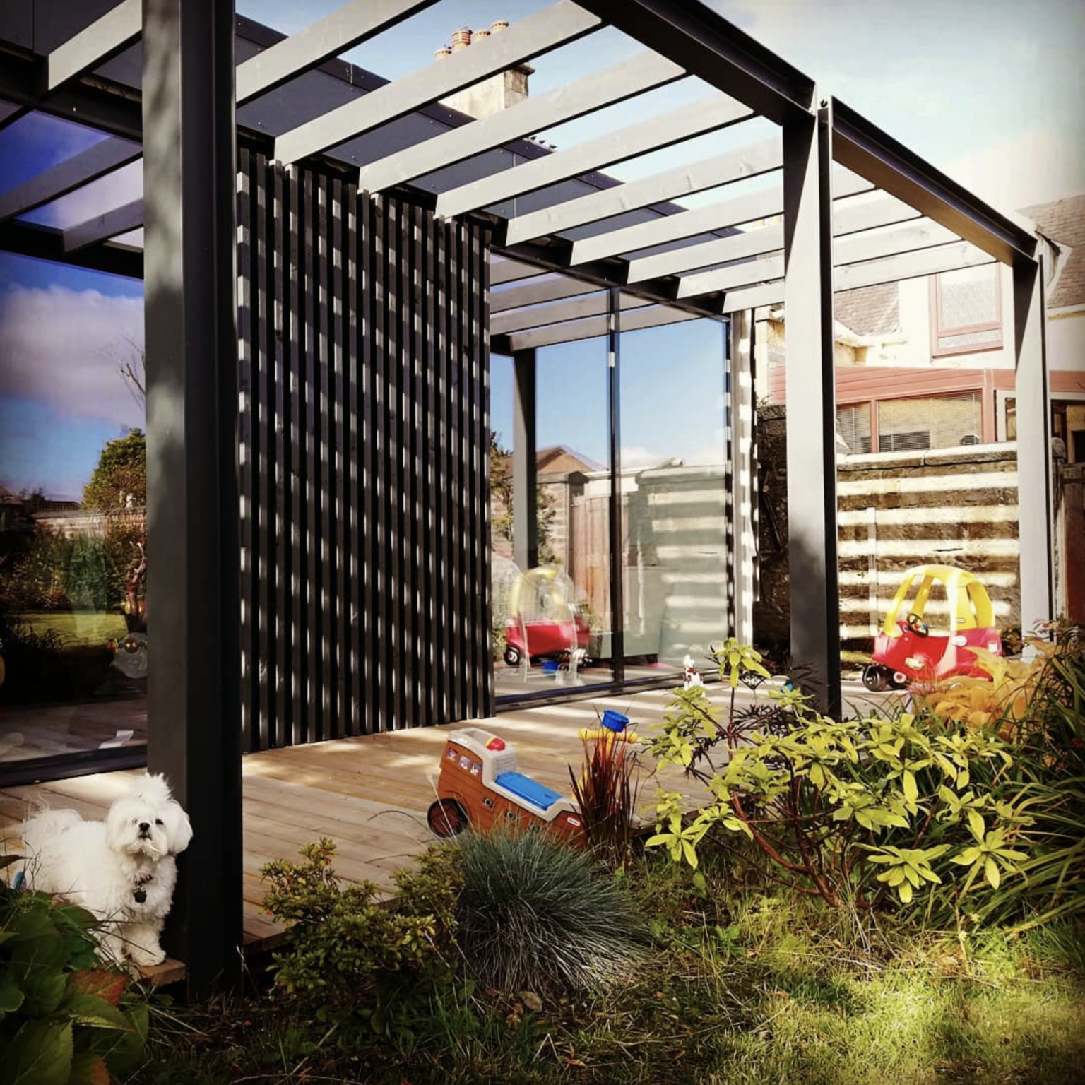 modern black timber and glass extension